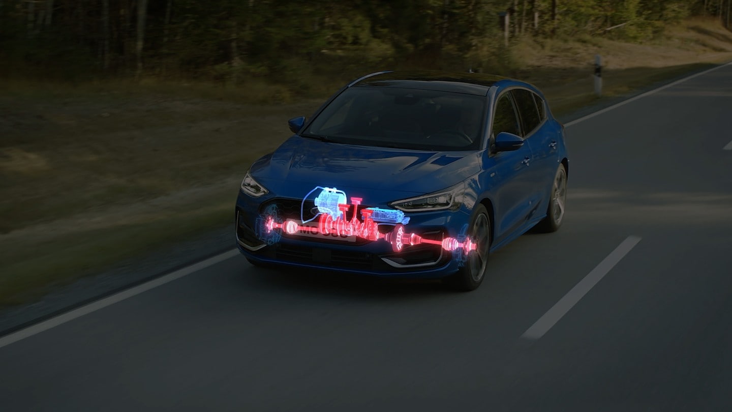 Ford Focus driving on a country road