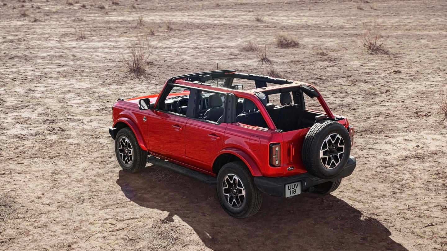 Red Ford Bronco rear view with the roof removed