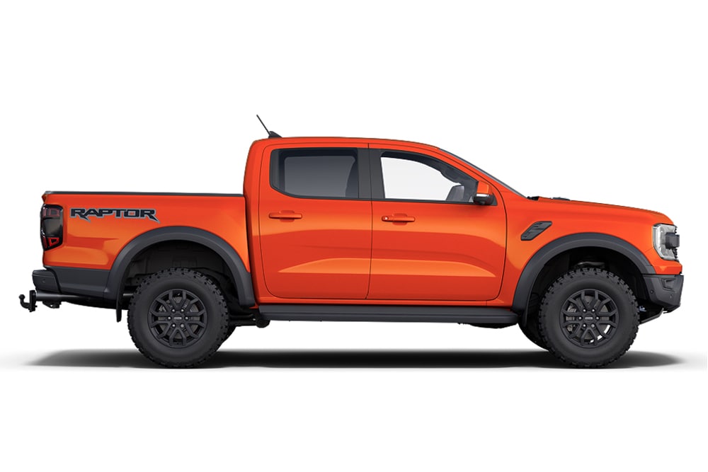 Oranžový Ford Ranger Raptor 4x4, součást řady sportovních vozů Ford.