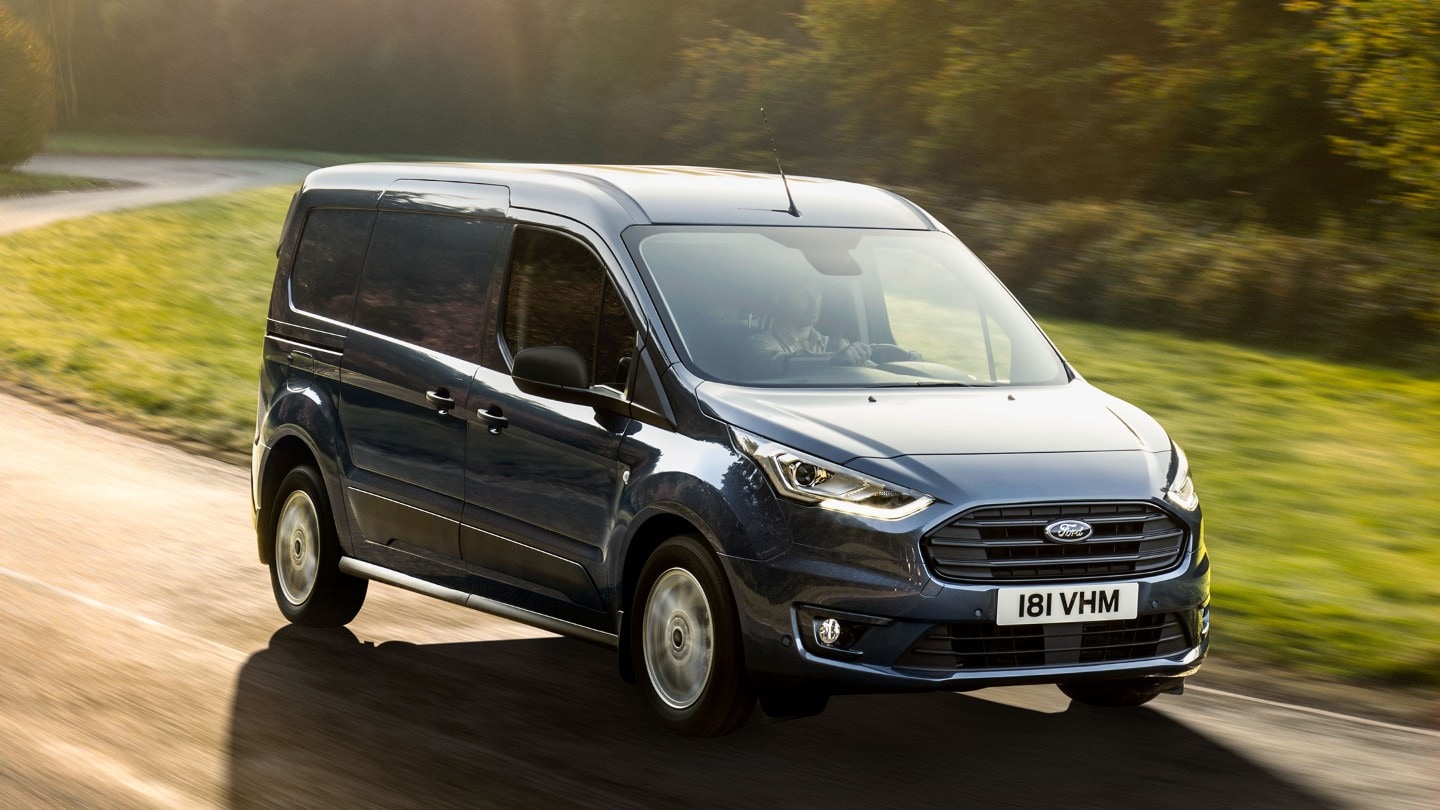 Ford Transit driving in country lane