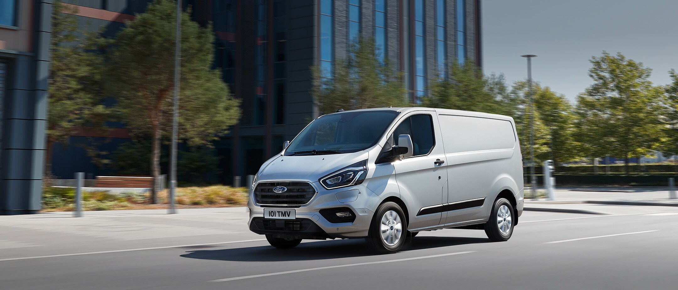 Ford Transit Custom PHEV driving in city Ford Transit Custom PHEV driving in city