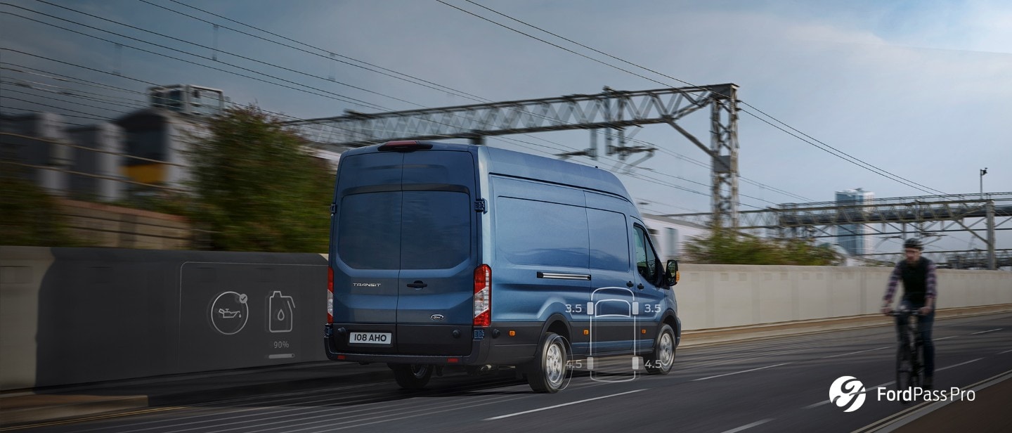 Blue Ford Transit Trail parked