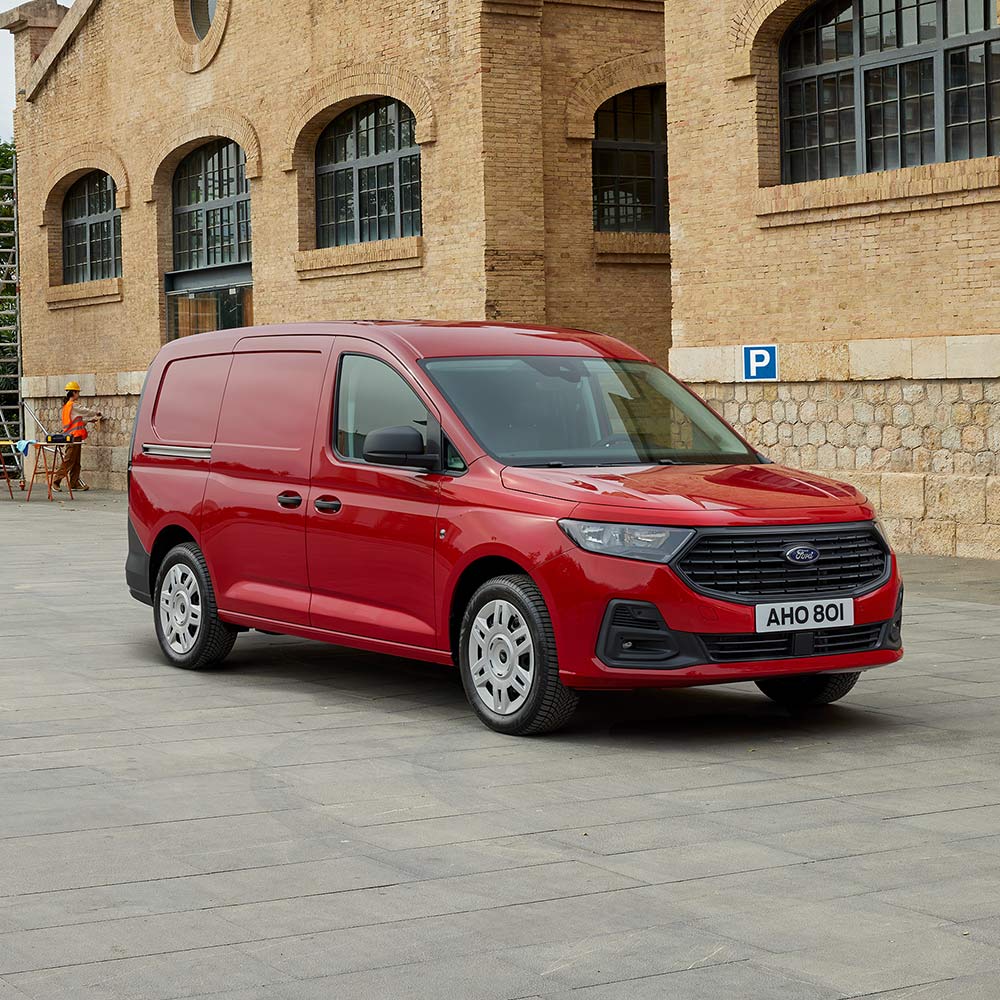 Ford Transit Connect Trend v barvě Červená Lava s přední maskou a automatickými světlomety.