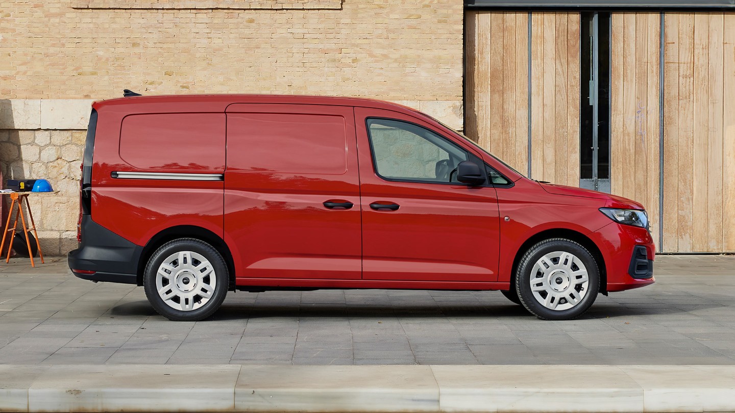 Side view of a Red Ford Transit Connect