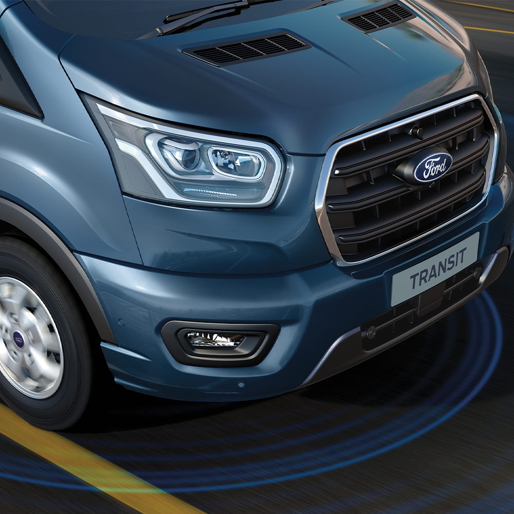 Blue Ford Transit Van with blue lines on road depicting use of Advanced Driver Assistance Systems.